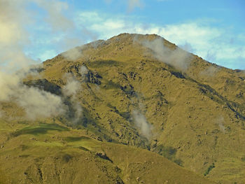 Scenic view of volcanic landscape against sky