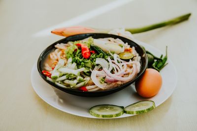 High angle view of salad in bowl on table