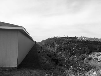 House on field against sky