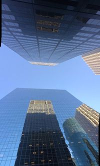 Low angle view of modern building against sky