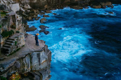 High angle view of rocks in sea