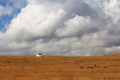 Scenic view of land against sky