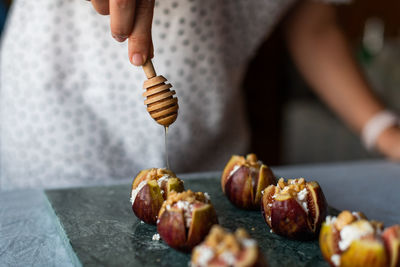 Midsection of person preparing food