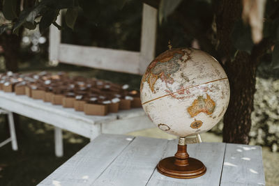 Close-up of vintage globe on a wooden table