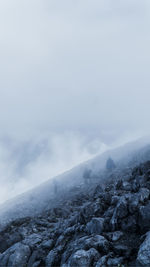 Scenic view of mountains against sky during winter