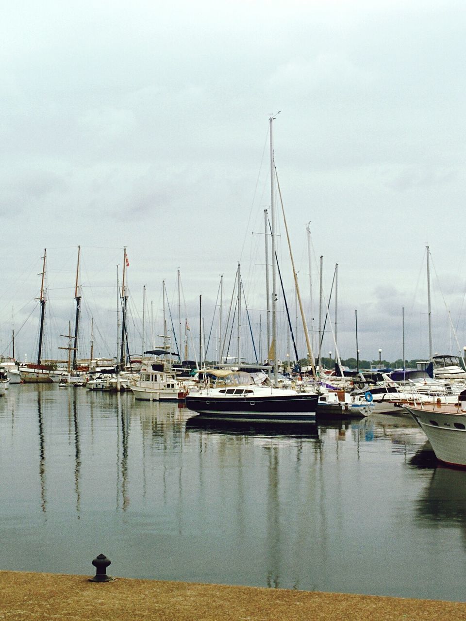 nautical vessel, transportation, water, boat, moored, mode of transport, mast, harbor, sailboat, sky, sea, lake, waterfront, nature, reflection, tranquil scene, day, tranquility, outdoors, travel