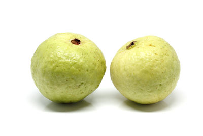 Close-up of apple against white background