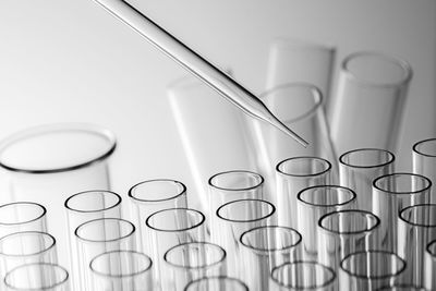 Close-up of laboratory equipment over white background