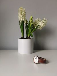 Close-up of flower vase on table