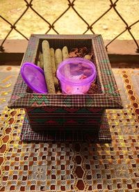 High angle view of wicker basket on table