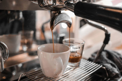 Close-up of coffee cup on table