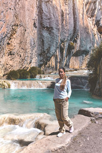 Young woman at viewpoint of the natural pools of millpu, ayacucho, peru. concept about travel