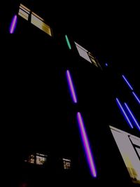 Low angle view of illuminated building at night