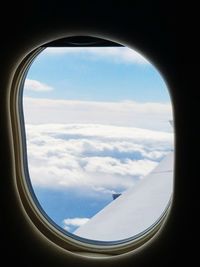 Scenic view of landscape seen through airplane window
