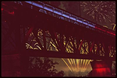 Low angle view of illuminated tree at night