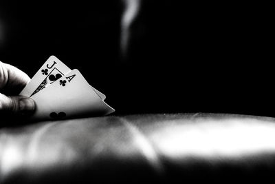 Close-up of hand holding guitar