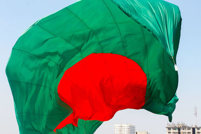 Low angle view of flag against sky