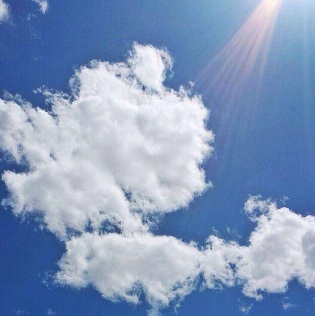 sunbeam, sky, blue, low angle view, sun, sunlight, beauty in nature, tranquility, scenics, cloud - sky, nature, tranquil scene, lens flare, sunny, sky only, cloud, bright, day, idyllic, white color