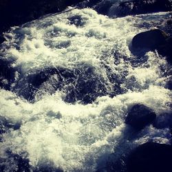 Waves splashing on rocks