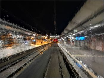 Cars on road at night during winter