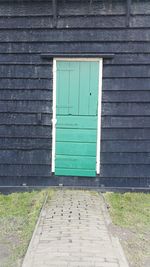 Close-up of closed door of house