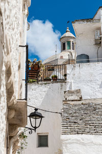 Streets of locorotondo. between white houses and dreamlike architecture. puglia to love, italy