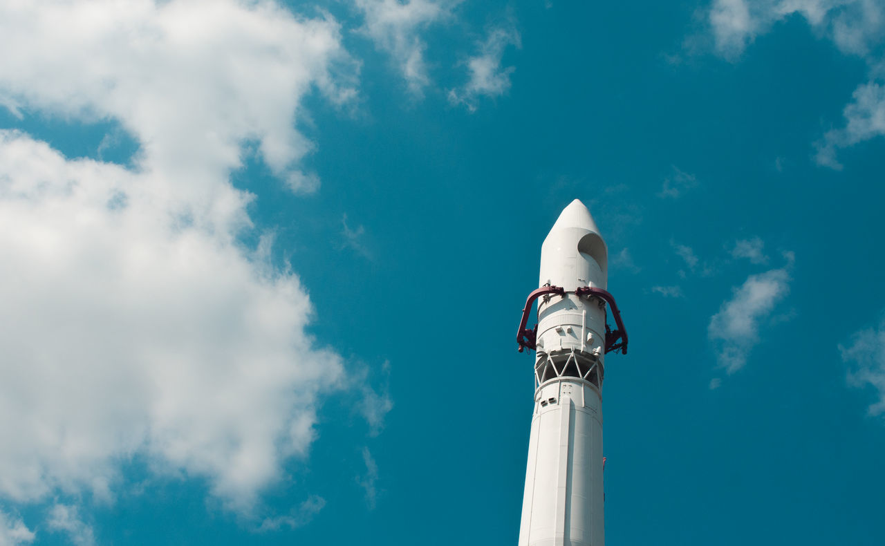 sky, cloud - sky, low angle view, architecture, nature, day, no people, blue, built structure, tall - high, tower, building exterior, architectural column, outdoors, travel, sunlight, technology, communication, travel destinations, high section, global communications