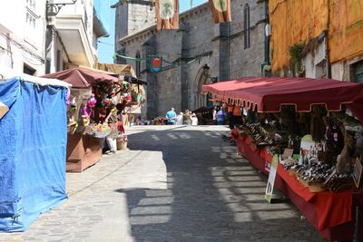 People walking at market in city