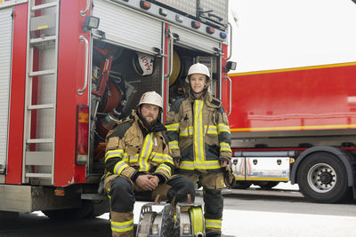 Firefighters in front of fire truck