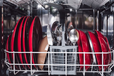 Close-up of kitchen utensils on rack