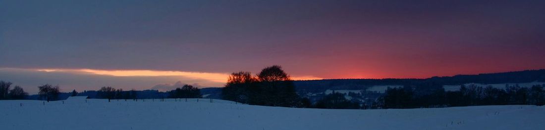 Scenic view of snow covered landscape