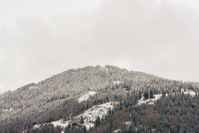 Scenic view of mountains against sky during winter