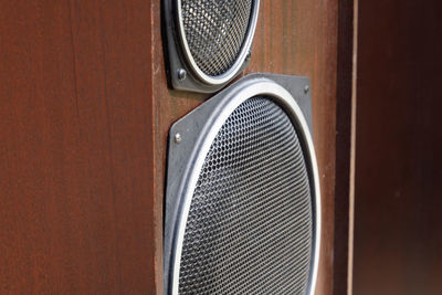 Close-up of vintage car on wooden door