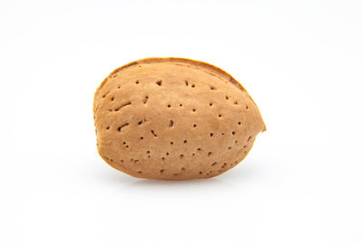 Close-up of bread against white background