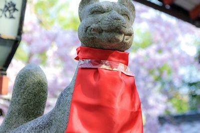 Close-up of statue against temple