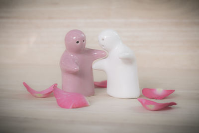 Close-up of pink flower on table