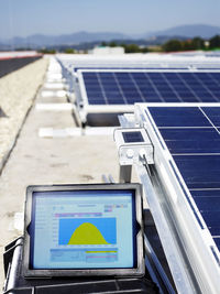 Measuring device in front of solar plant, close-up