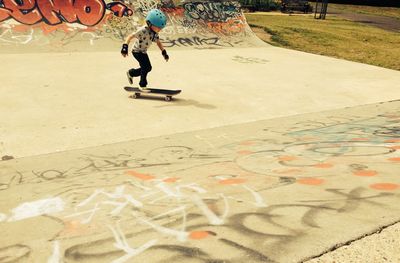 Full length of man skateboarding on skateboard