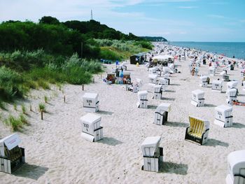 High angle view of chairs on beach