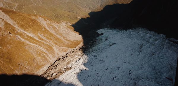 High angle view of rock formation in sea