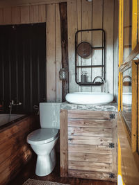 Empty chairs in bathroom at home