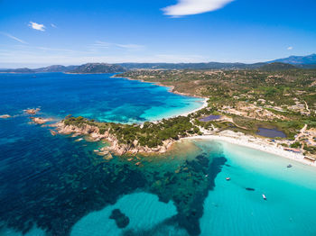 High angle view of sea shore against sky