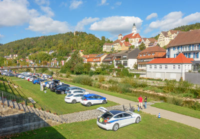 High angle view of buildings in city against sky