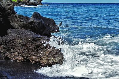 Close-up of rocks in sea