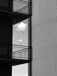 Railing on steps against sky