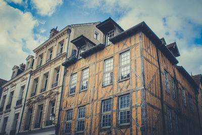 Low angle view of residential building against sky