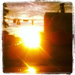 Sun shining through clouds