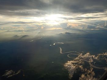 Aerial view of lake against sky during sunset