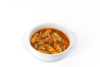 High angle view of food in bowl against white background