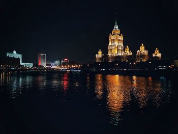 Illuminated buildings in city at night